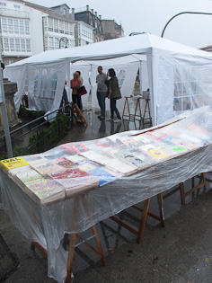 Photograph of the charity market under the rain